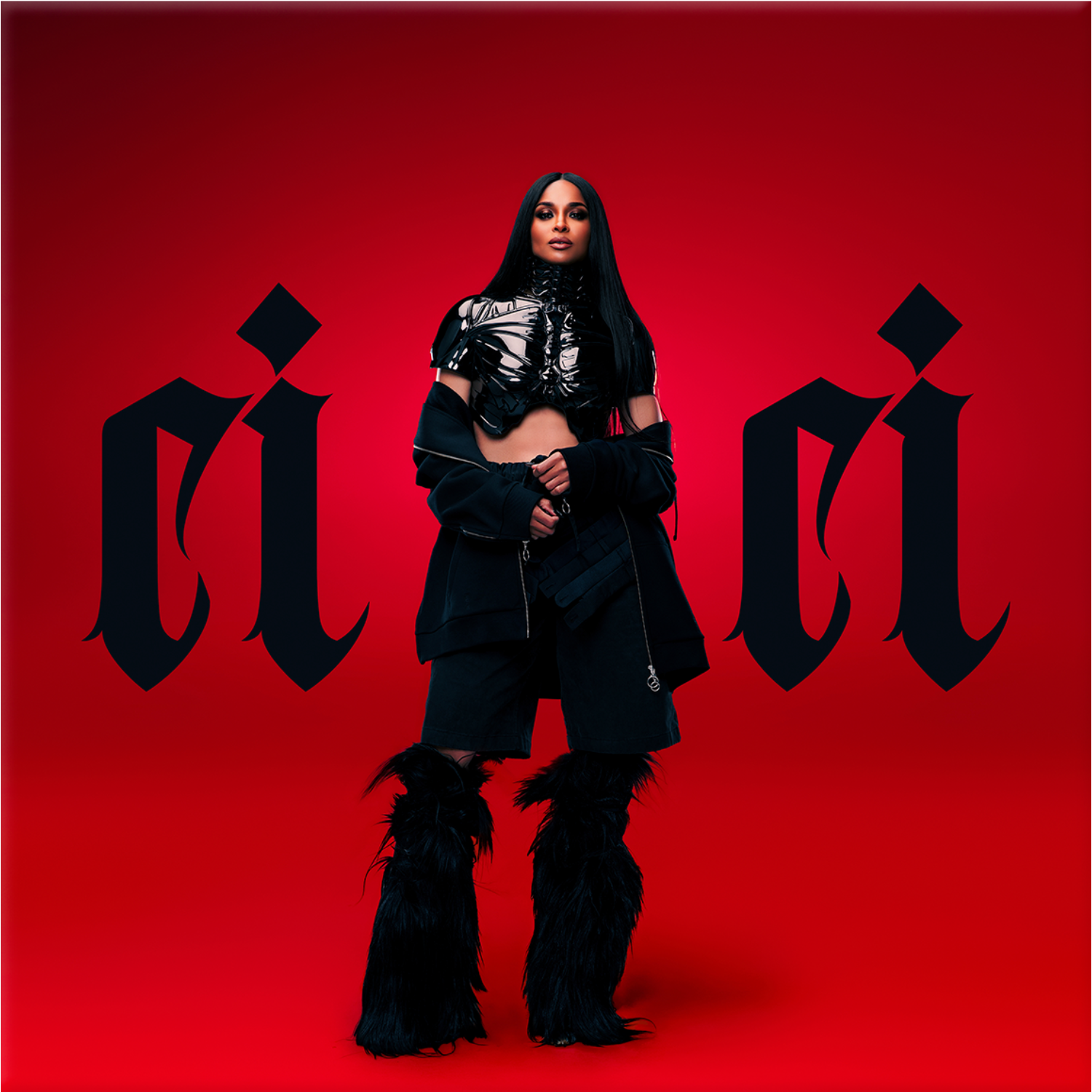 Ciara in black outfit with high boots on a red background with 'cici' text